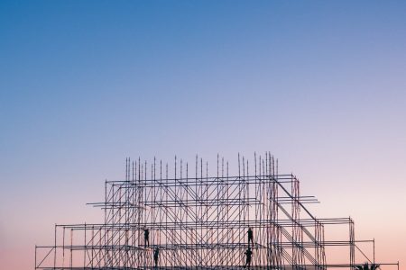 Photo of People on Building Under Construction